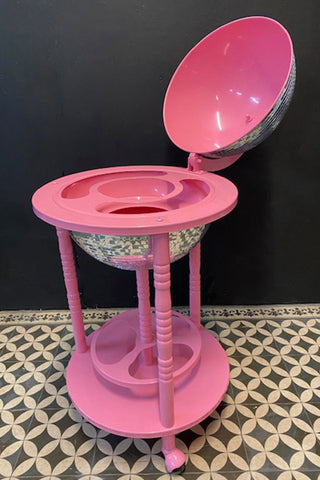 Open Pink Disco Ball Drinks Trolley in a dark room.