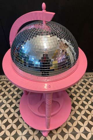 The top of the pink and silver disco ball drinks trolley.