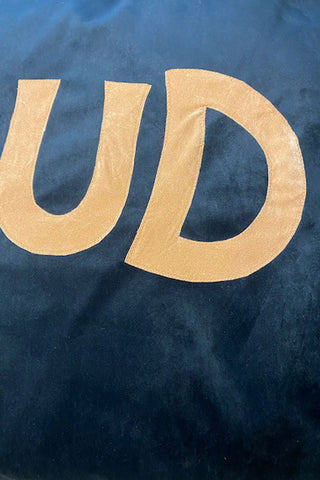 Raised lettering on the 'ud' of the stud bed.