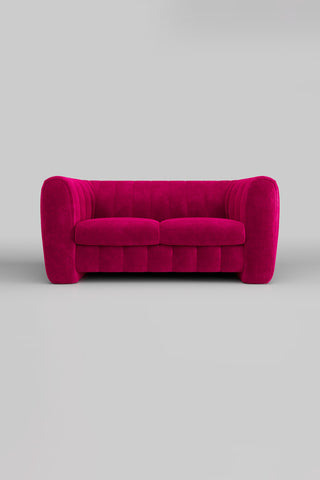 The Bowie Medium Sofa In Luxe Needlecord Velvet Harry's Pink on a plain background, seen from the front.