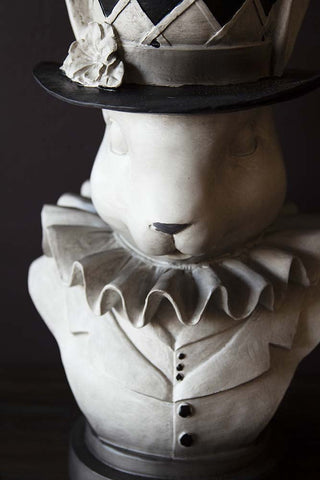 Close-up detail image of the head on the Alice In Wonderland 'Rabbit' Bust Plant Holder with dark wall background