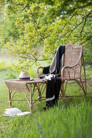 Lifestyle image of the Beautiful Cane Seated Sun Lounger