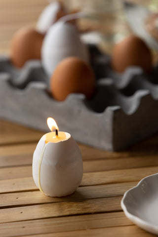 Image of the Egg Candle lit