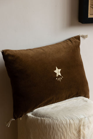 Lifestyle image of the Star Velvet Cushion In Bronze